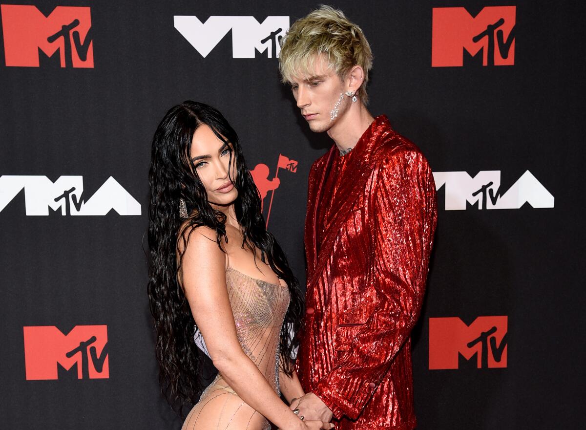 Megan Fox enceinte et fraîchement séparée de Machine Gun Kelly ? Découvrez la raison de leur rupture